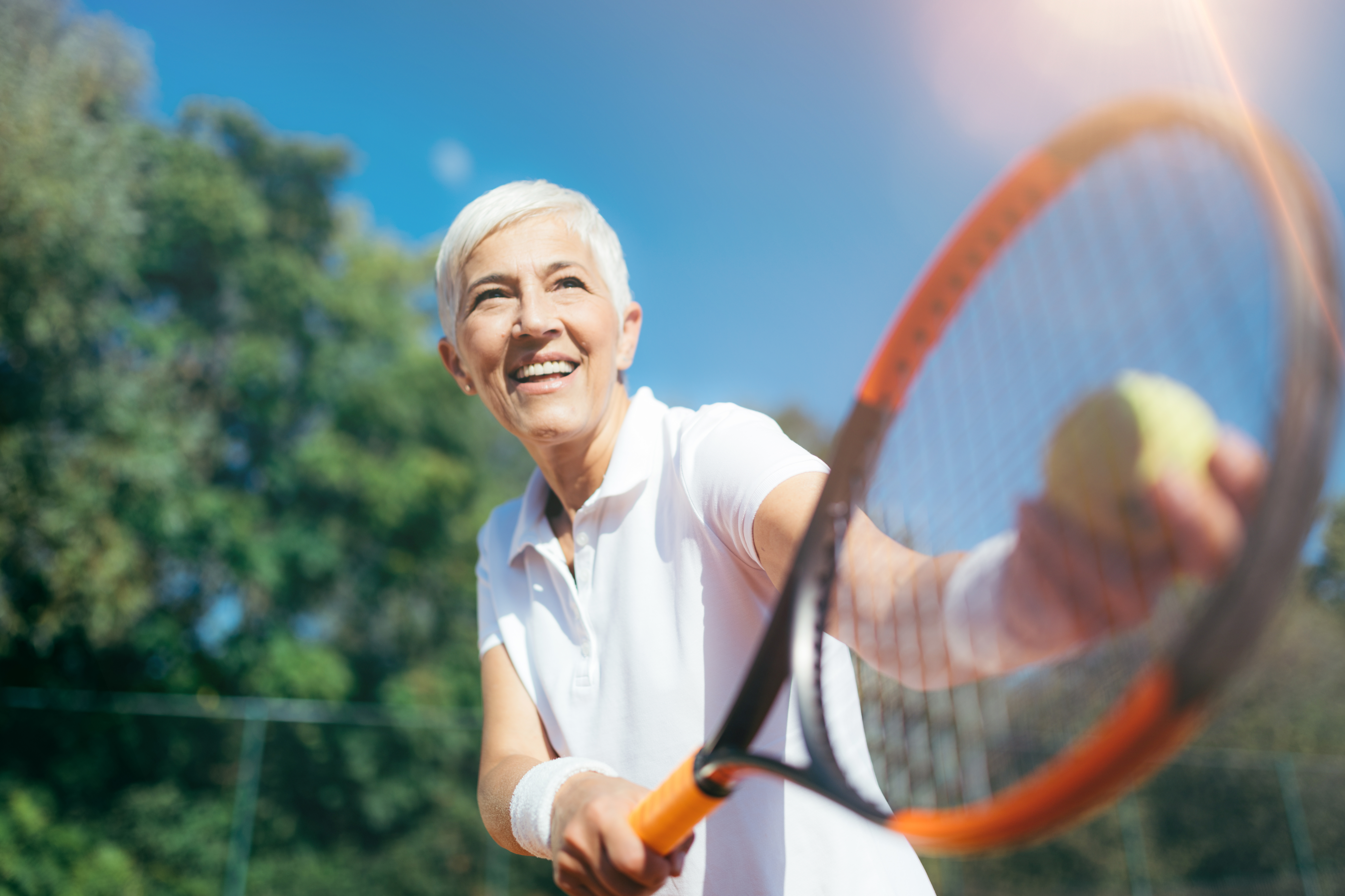 Woman-Tennis-Serve